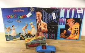 A mixed lot including a Tri-ang toy sports car, NO KEY, and three record albums, to include