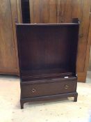 A Stag open bookcase with two adjustable shelves over single drawer on square supports, measures