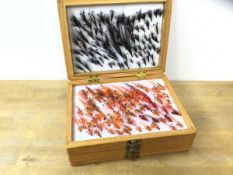 Fishing interest:- A box of fishing flies arranged in six trays, plaque to top Kenneth R Vernon,