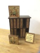 A 1920's/30's children's picture puzzle game comprising of twelve blocks in bookcase, each with
