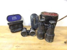 A pair of binoculars, eye pieces inscribed Brown 76 St Vincent St Glasgow, measures 15cm high,