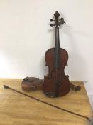 A Viola (15" body), a part size violin (12.5" Body) and a bow