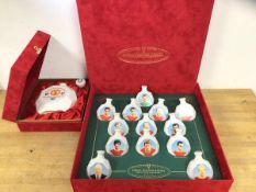Football Interest:- a Manchester United miniature decanter set, each decanter depicting a player and