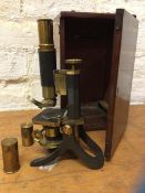 An early 20thc microscope inscribed C Collins Opticians Webster Condenser Titchfield Street