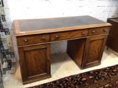 A Victorian mahogany pedastal kneehole desk top with insert skiver writing surface over three