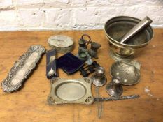 A mixed lot including two Birmingham hallmarked silver candlesticks and a comb back marked stirling,