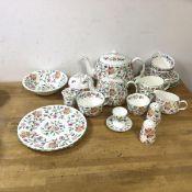 A Minton Haddon Hall pattern part tea set includes teapot which measures 15cm high, along with three