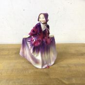 A Royal Doulton china figure, Sweet Anne, measures 19cm high