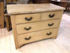 An Edwardian pine chest fitted with two short and two long drawers, raised on stile supports, 83cm x