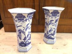 A pair of Bombay Company Chinoiserie vases of waisted hexagonal form with blue and white floral