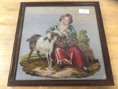 A tapestry panel depicting girl feeding goat from basket, measures 36cm x 36cm