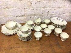 A 1930's Foley teaset including ten teacups, each measuring 7cm high, twelve saucers, twelve side