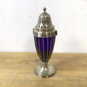 A 1903 Birmingham silver sugar caster, the perforated top with caged body holding a blue glass