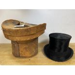 A gentleman's top hat inscribed to interior David Scott, Edinburgh, measures approximately 56.5cm