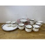 A set of six Royal Albert Sandringham pattern teacups, saucers, side plates, a milk jug, a sugar