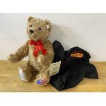 Golf Interest:- A Jack Nicklaus Steiff bear (Golden) with signature to paw, and travelling bag, bear