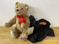Golf Interest:- A Jack Nicklaus Steiff bear (Golden) with signature to paw, and travelling bag, bear