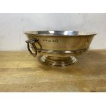 A 1935 Birmingham silver footed bowl with two drop handles to sides, measures 9cm x 22cm, weighs