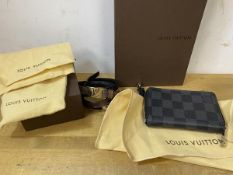 Two Louis Vuitton cuffs, one checkered black leather, the other brown, each measures 41cm, a black