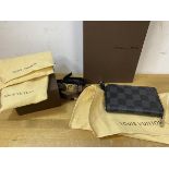 Two Louis Vuitton cuffs, one checkered black leather, the other brown, each measures 41cm, a black