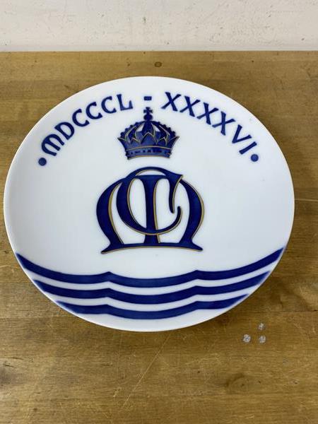 A late 19thc Royal Copenhagen plate with the date 1850 - 96, above crown initials CM, measures