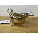 A 1901 Birmingham silver sauce boat, makers mark TD, measures 9cm high, weighs 147 grammes