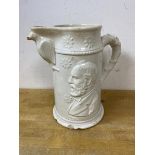 A late 19thc glazed stoneware pitcher depicting President Garfield to either side, spout supported