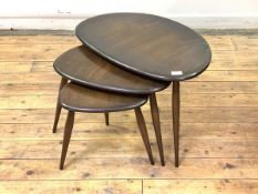 Ercol, A stained elm Pebble nest of three tables, H41cm, W65cm, D44cm