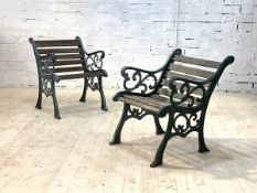 A Pair of scrolled cast iron and slatted garden seats, (Slats A/F) H78cm, W60cm, D66cm