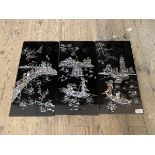 Three Japanese lacquered panels with mother of pearl inlay depicting traditional scenes, each