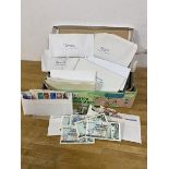 A mixed lot including a collection of international stamps, all in envelopes with country's names,