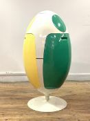 A Vintage Italian recycling bin, of egg form, the segmented interior enclosed by green blue and