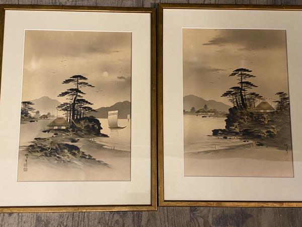 Two Japanese prints with a gilt embellishments, both with characters and red seal marks, measure