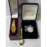A group of three watches including a miniature pocket watch by Jean-Pierre with silver case and