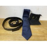 A Louis Vuitton silk tie, a Burberry belt marked 36/90, and a Daks belt (3)