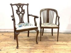 A Chippendale style mahogany carver chair, with scrolled crest rail over pierced splat back,