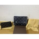 A Louis Vuitton wallet with fold-over top, measures 11cm x 14cm, a wallet with zipper, one with