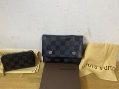A Louis Vuitton wallet with fold-over top, measures 11cm x 14cm, a wallet with zipper, one with