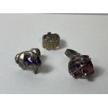 Two white metal rings, one with amethyst stone, both inscribed Wiggers Handmade in Denmark, size K