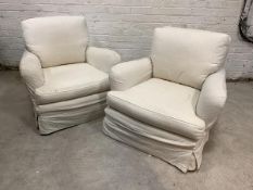 A pair of easy chairs, circa 1930s/1940s, with later fitted natural cotton cover and feather