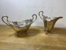A 1915 Glasgow silver milk jug and sugar bowl, makers mark JAF, jug measures 14cm high, combined
