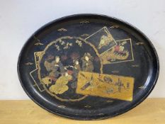 A Japanese lacquer oval tray with gilt decoration, measures 40cm x 31cm