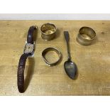 A group of three hallmarked silver napkin rings, a Georgian Scottish teaspoon, combined weight 61