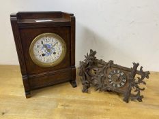 A 1920's / 30's mantel clock with galleried top above circular dial, with blue and white decoration,