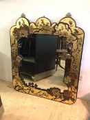 A late 20thc Chinese style gilt framed wall mirror, the frame decorated with birds amongst