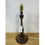 An oak candlestick style table lamp, measures 37cm to top of lampholder