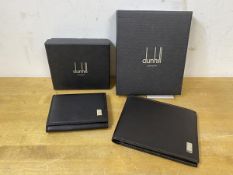 A Dunhill bill fold wallet, measures 10cm x 12cm, a coin wallet, both with original boxes