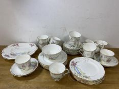 A set of twelve 1920's Hammersley teacups, measure 7cm high, eleven saucers, twelve side plates, a