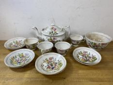 A 19thc 14pc teaset with teapot, measures 15cm high, four teacups, eight saucers, a bowl, all with