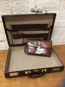 A Jensen briefcase, interior with arrangement of pockets, measures 37cm x 47cm x 9cm along with a